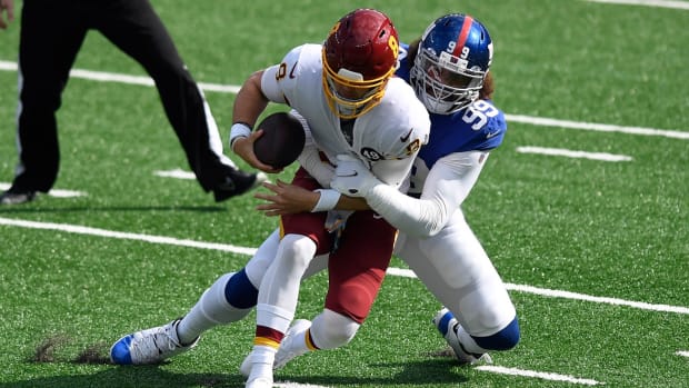 Kyle Allen Tackled © Danielle Parhizkaran  2020 Oct 18